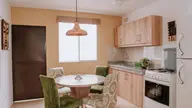 Comedor y cocina del modelo Triana 3