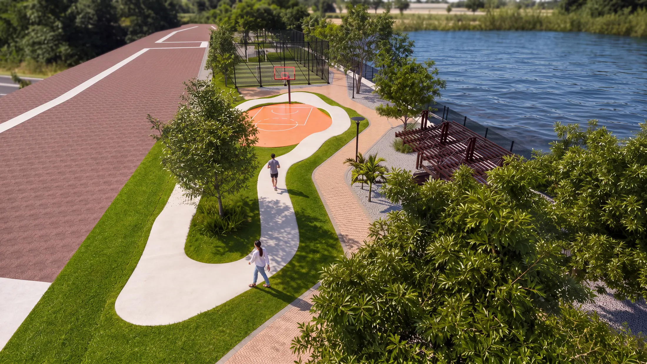 Malecón junto al río Daule en Ciudad Santiago, con sendero, cancha deportiva y áreas verdes